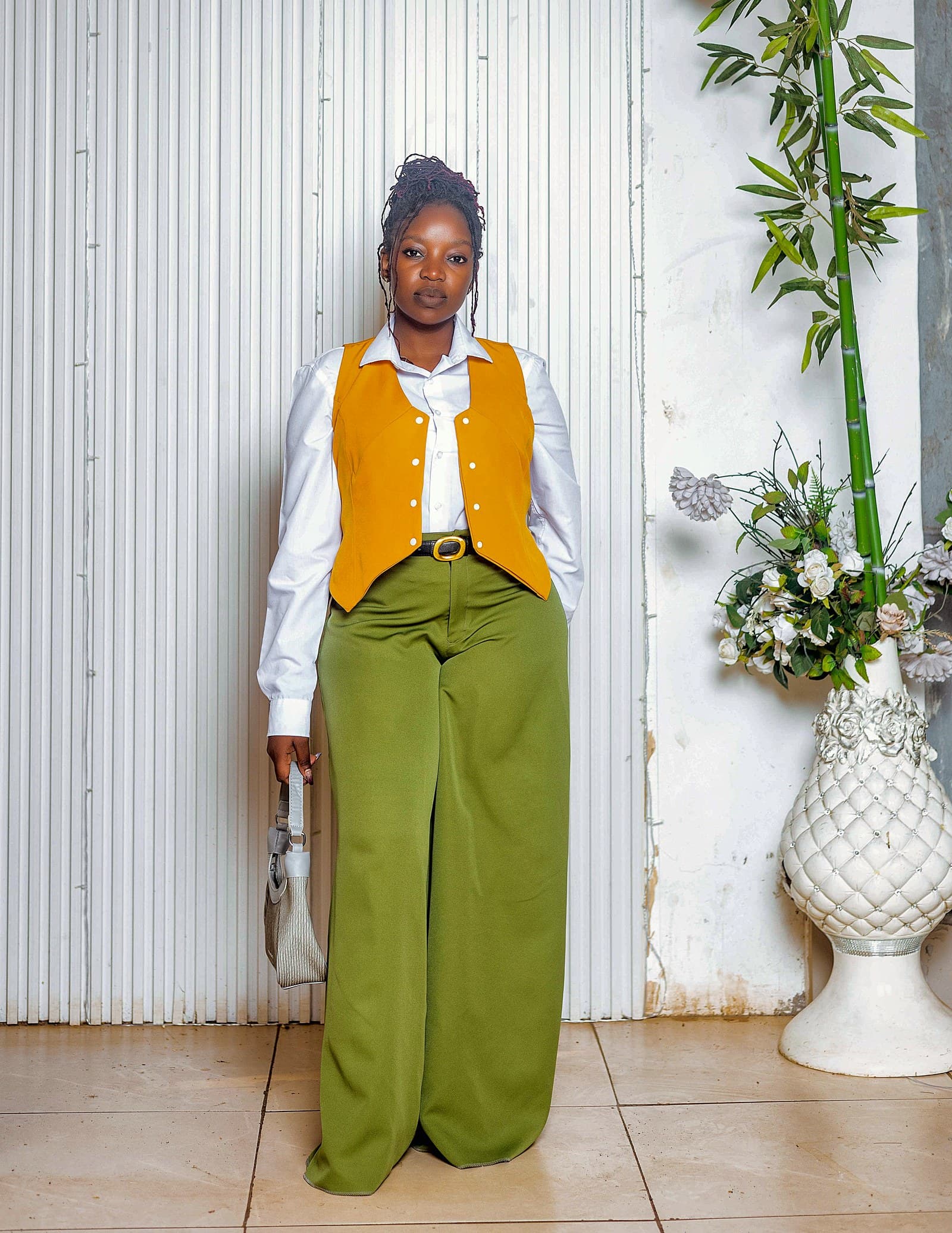 Mustard waistcoat with olive wide-leg trousers