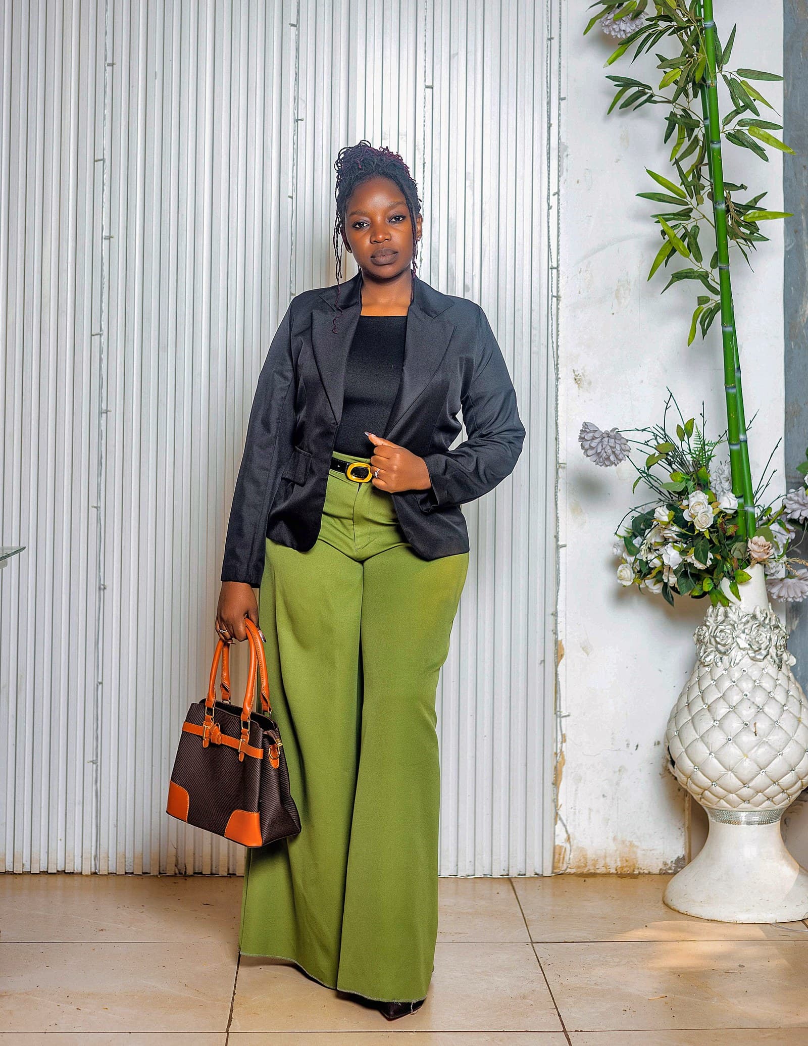 Black blazer with olive wide-leg trousers