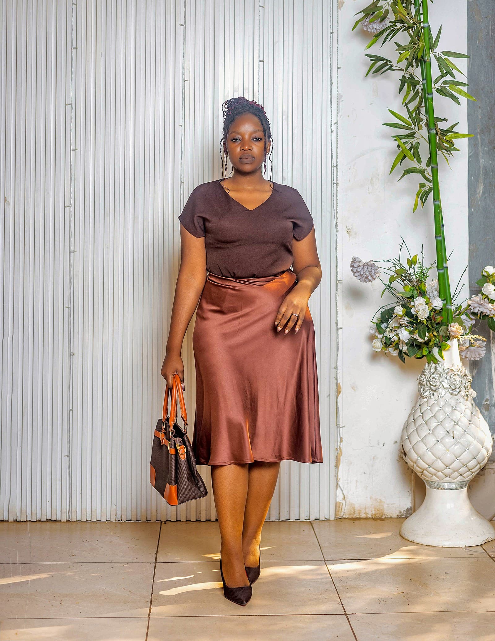 Brown top with bronze satin skirt