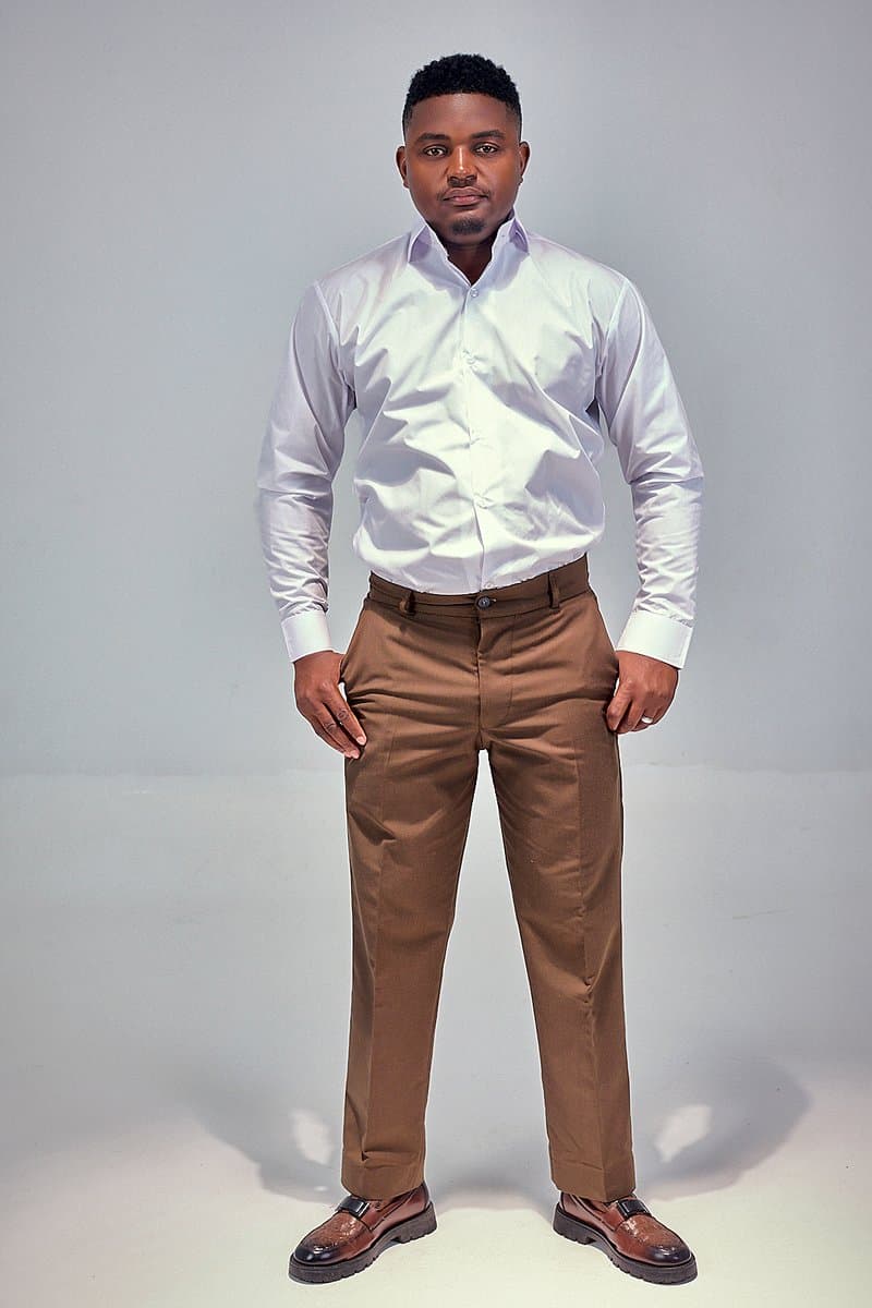 Chocolate-brown tailored trousers with white shirt