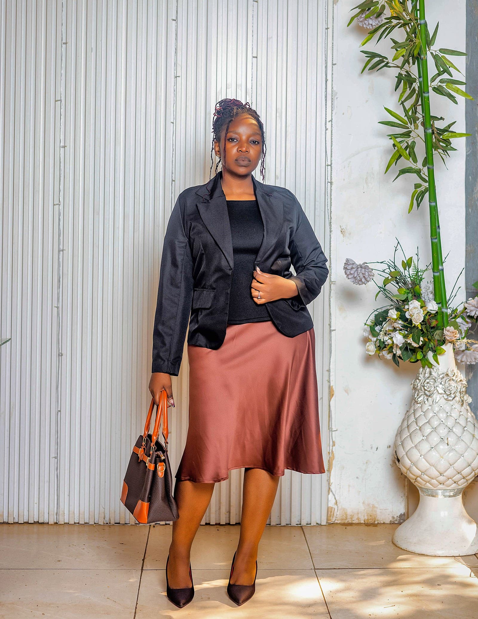 Black blazer with bronze satin skirt
