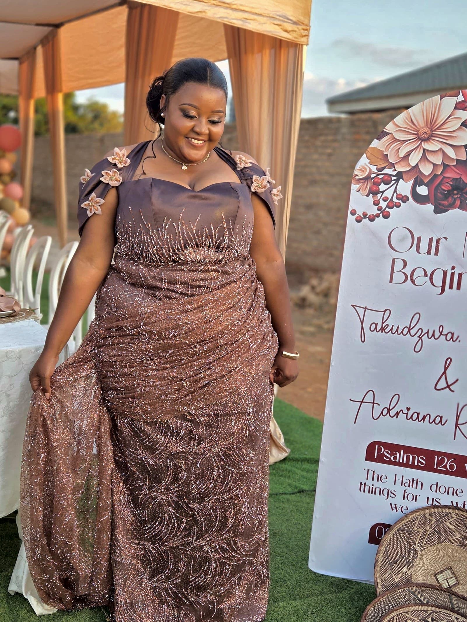 Bronze lace gown, full length, at the roora